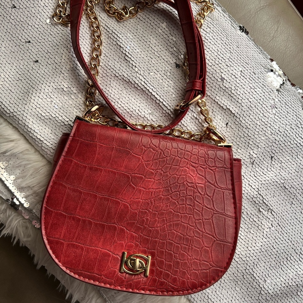 Red Cross body BeBe purse, new never used, no wear and tear!! Open to offers